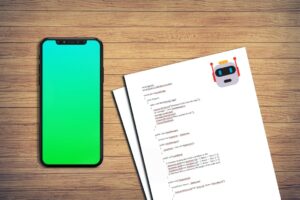 Two pieces of paper with AI generated code on a wooden desk with a smartphone on the left.